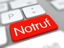 Weiße Tastatur mit einer roten Notruftaste