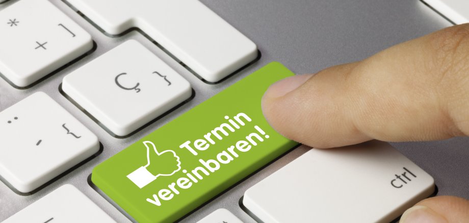 Termin vereinbaren! tastatur finger