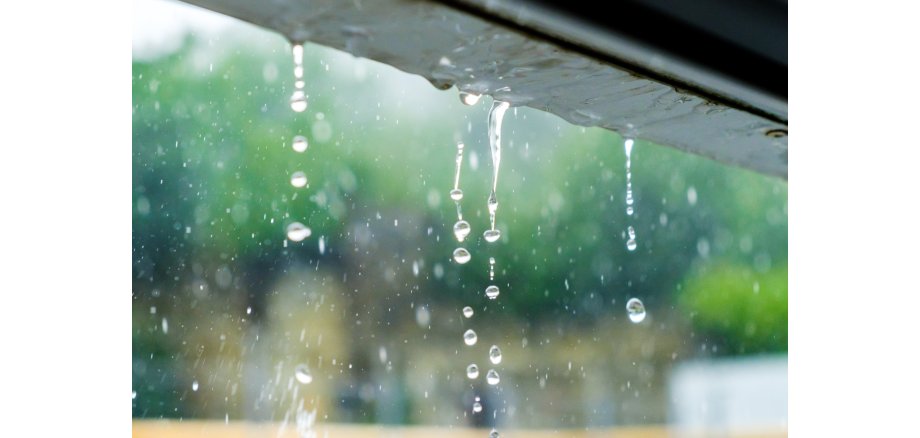 Rainwater drains off the roof.